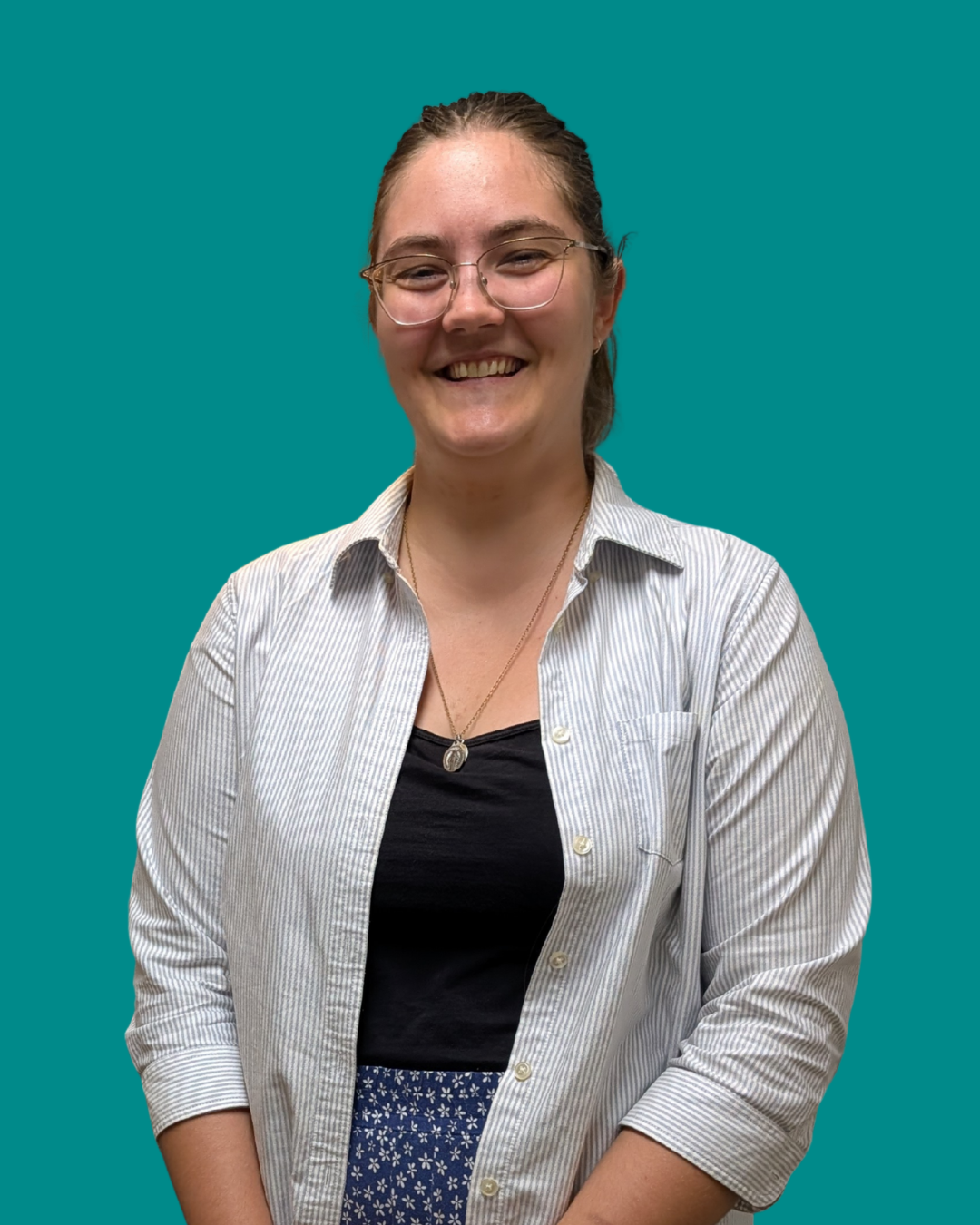 Cathy Kilpatrick, Registered Psychotherapist at Elite Counselling & Consulting Services, smiling in a professional headshot against a teal background.